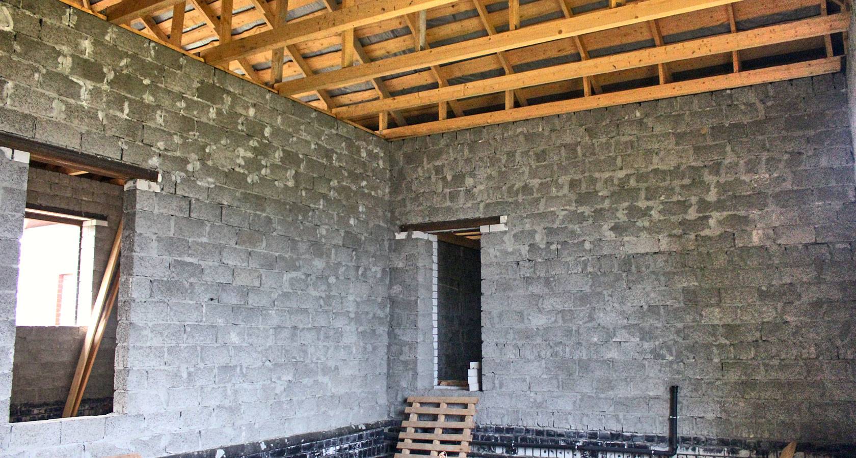 Дом из арболита: строительство из блоков(панелей) и монолита, технология, фундамент и опалубка, плюсы и минусы